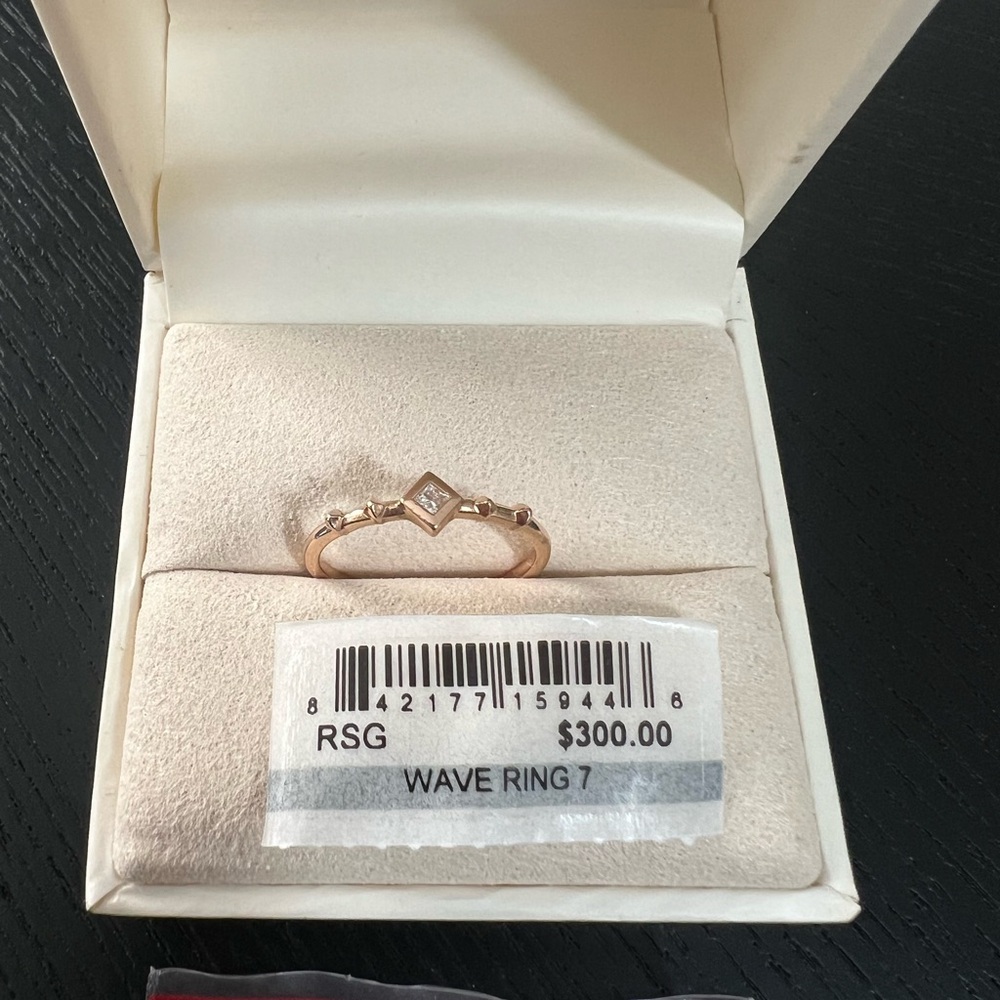 Kendra Scott 14k Rose Gold Wave Ring- white diamond size 7.  Hard to find